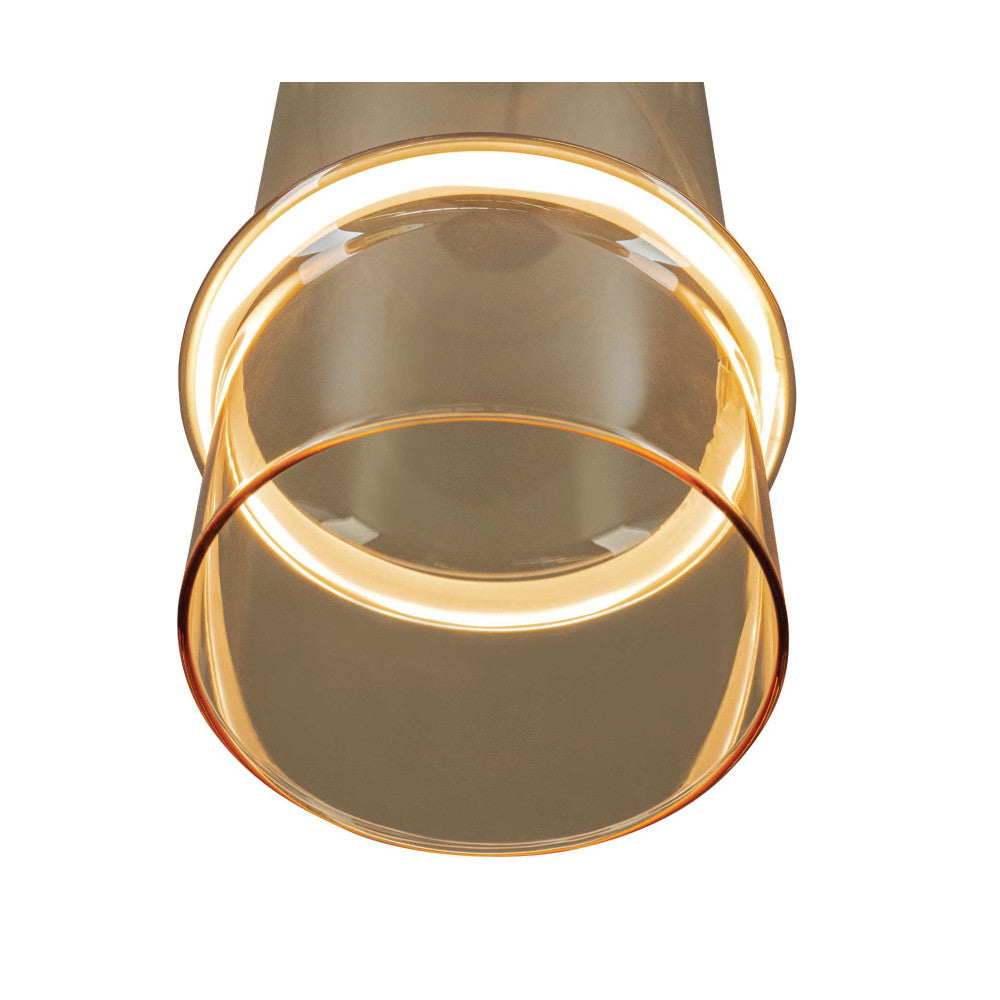 Détail du bas de l'abat-jour en verre ambré avec anneau lumineux.