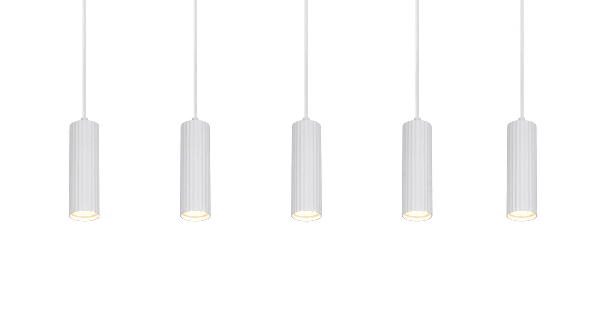 Les cinq cylindres allumés diffusant une lumière chaude vers le bas