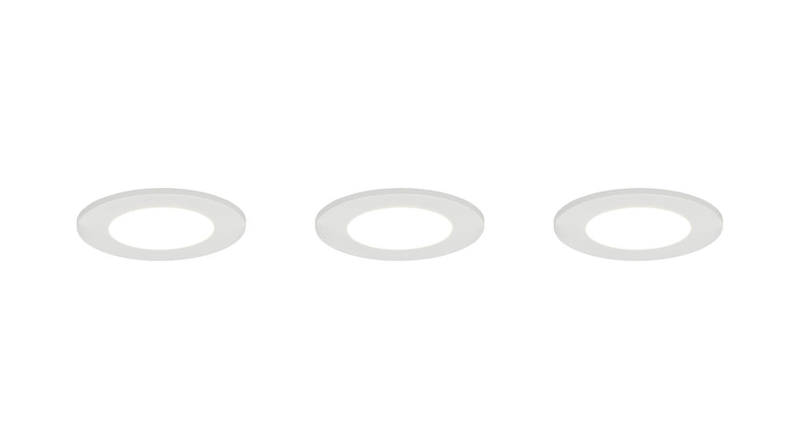 Trois spots éteints vus de face, diffuseur central et collerette fine