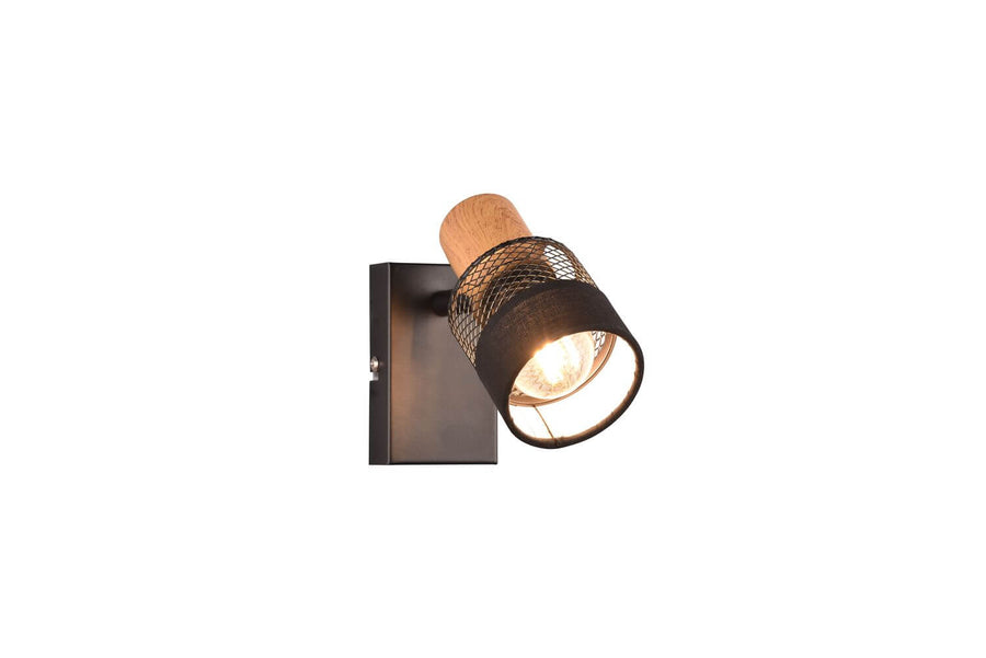Vue de profil du spot noir mat allumé, mettant en valeur le cerclage en bois clair.
