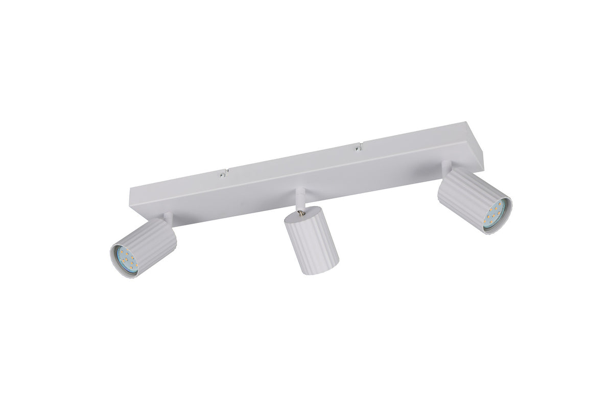 Détail des têtes cylindriques striées avec LED apparentes, luminaire plafond blanc