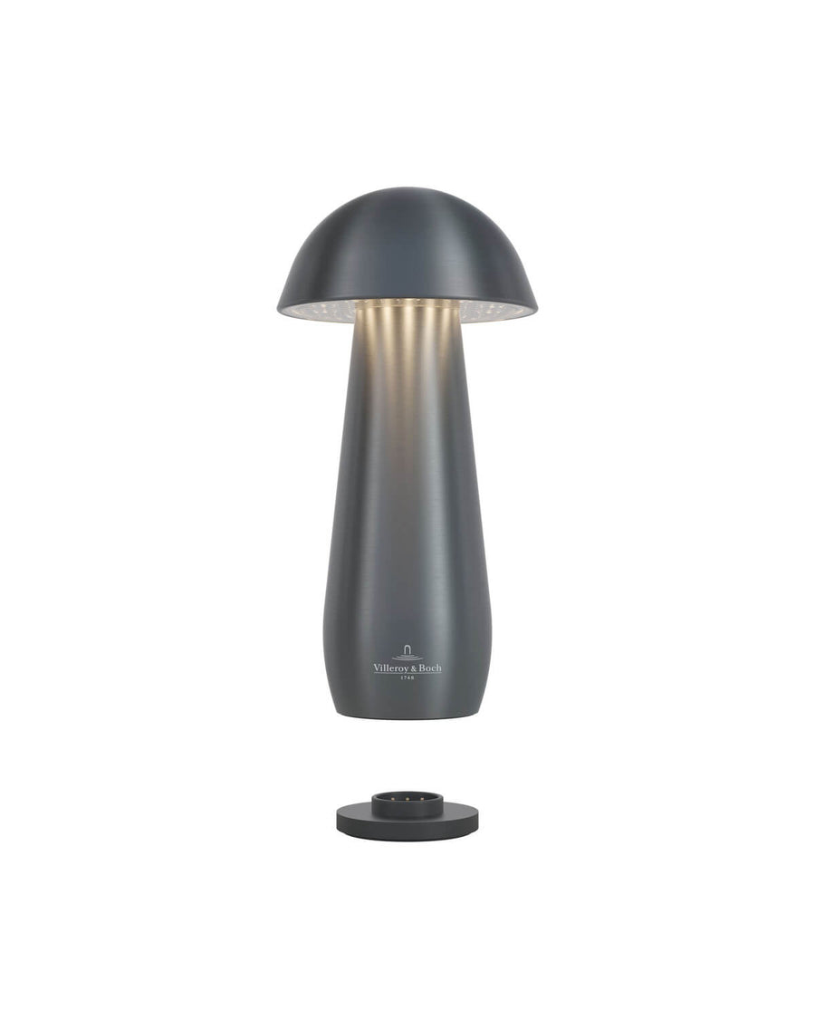 Vue éclatée montrant le socle de recharge séparé et le dessous lumineux de l'abat-jour.