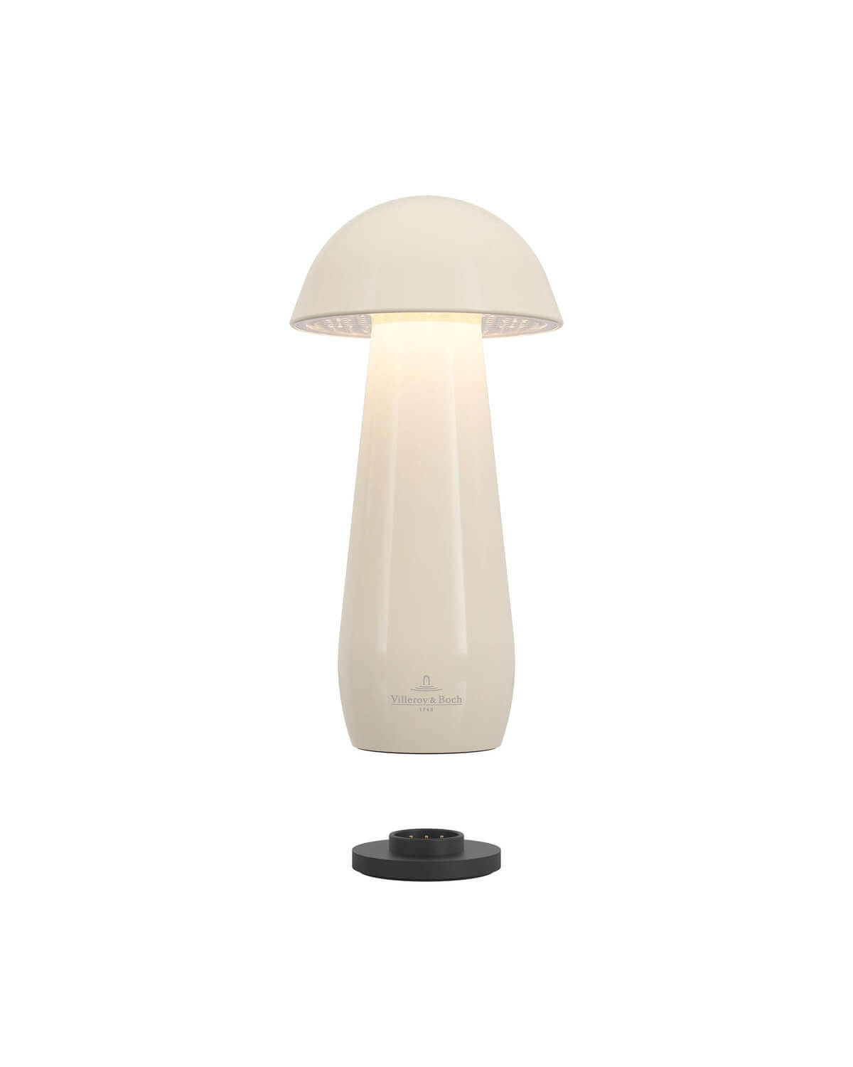 Lampe crème suspendue au-dessus de sa base de recharge noire, vue éclatée
