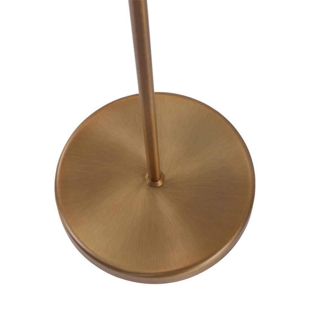 Détail de la base ronde lestée en bronze du lampadaire Bella