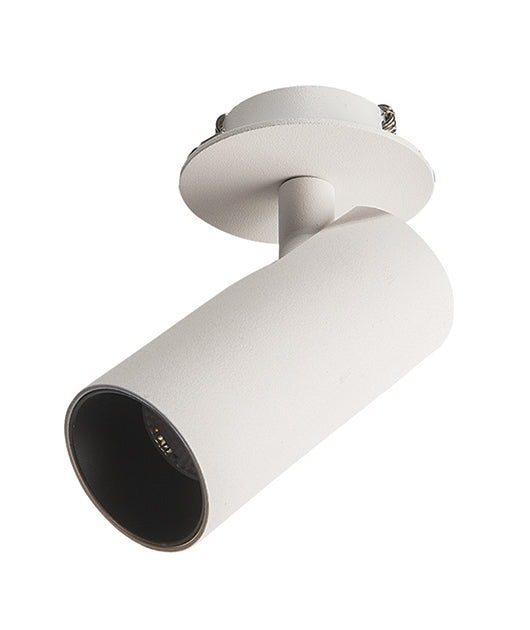 Vue rapprochée du projecteur cylindrique blanc sable et de sa base ronde.