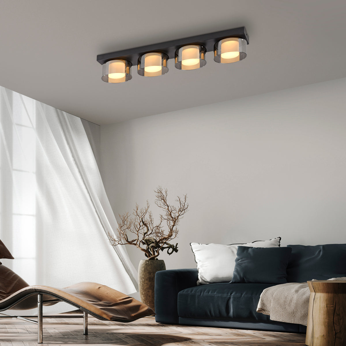 Mise en ambiance dans un salon moderne, plafonnier allumé au plafond au-dessus d'un canapé