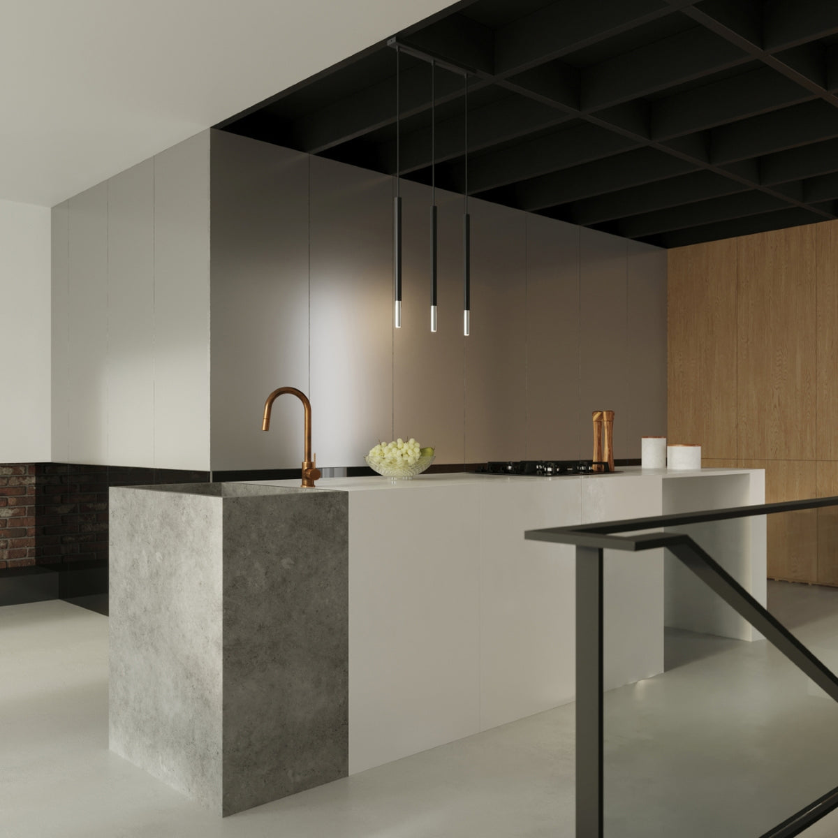 Mise en ambiance dans une cuisine moderne, suspensions alignées au-dessus de l'îlot central.