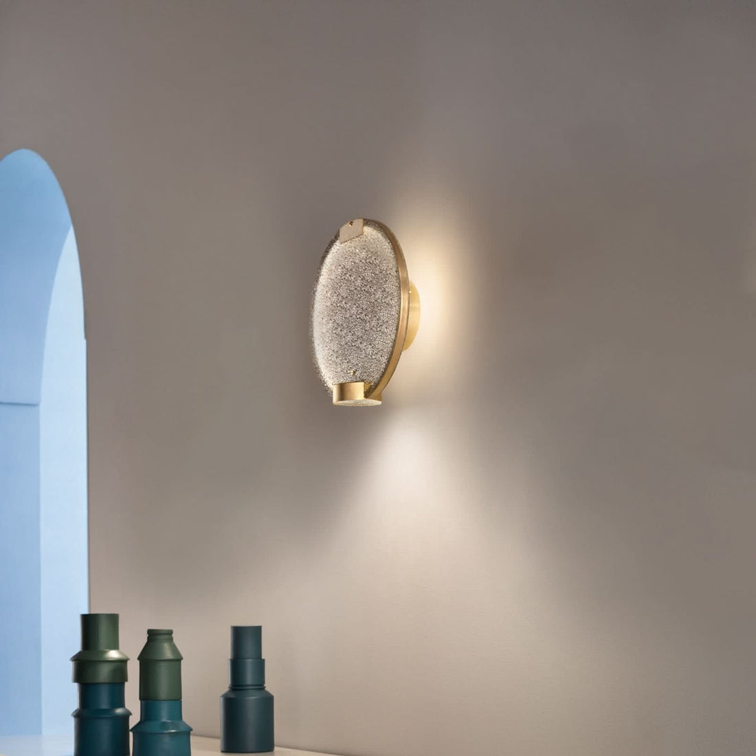 Applique murale LED Horo A en verre, laiton brossé et gris fumé, Ø 30 cm
