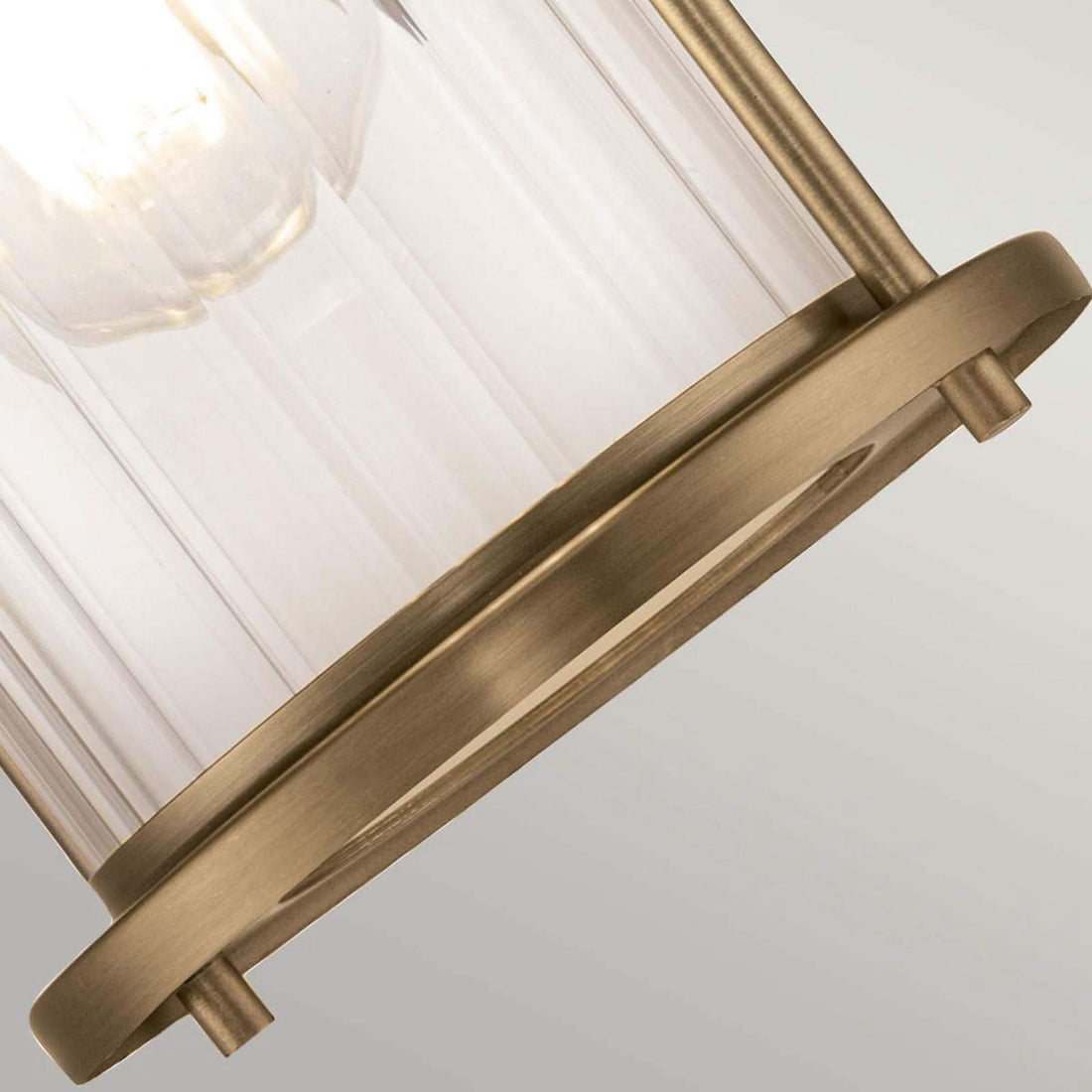 Applique murale Riggs IP44 en verre, laiton ancien et transparent, hauteur 21,8 cm, largeur 14 cm