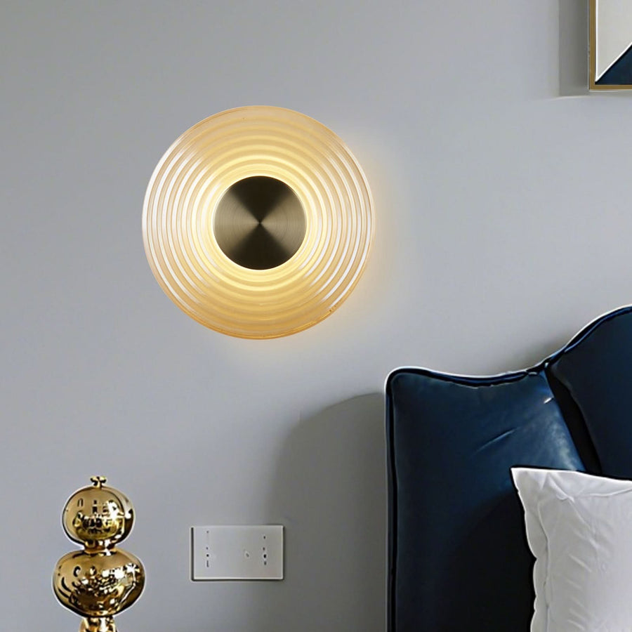 Applique murale LED Cleo en verre, ambre et laiton, Ø 30 cm
