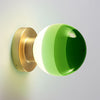 Applique murale LED Dipping Light A2 en verre, vert et laiton, Ø 12,5 cm