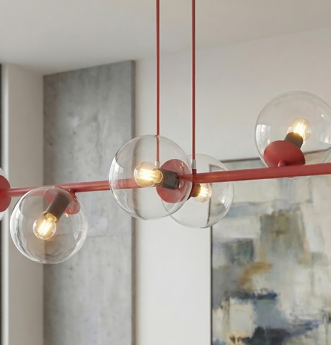 Détail rapproché des globes en verre clair, douilles rouges et ampoules allumées