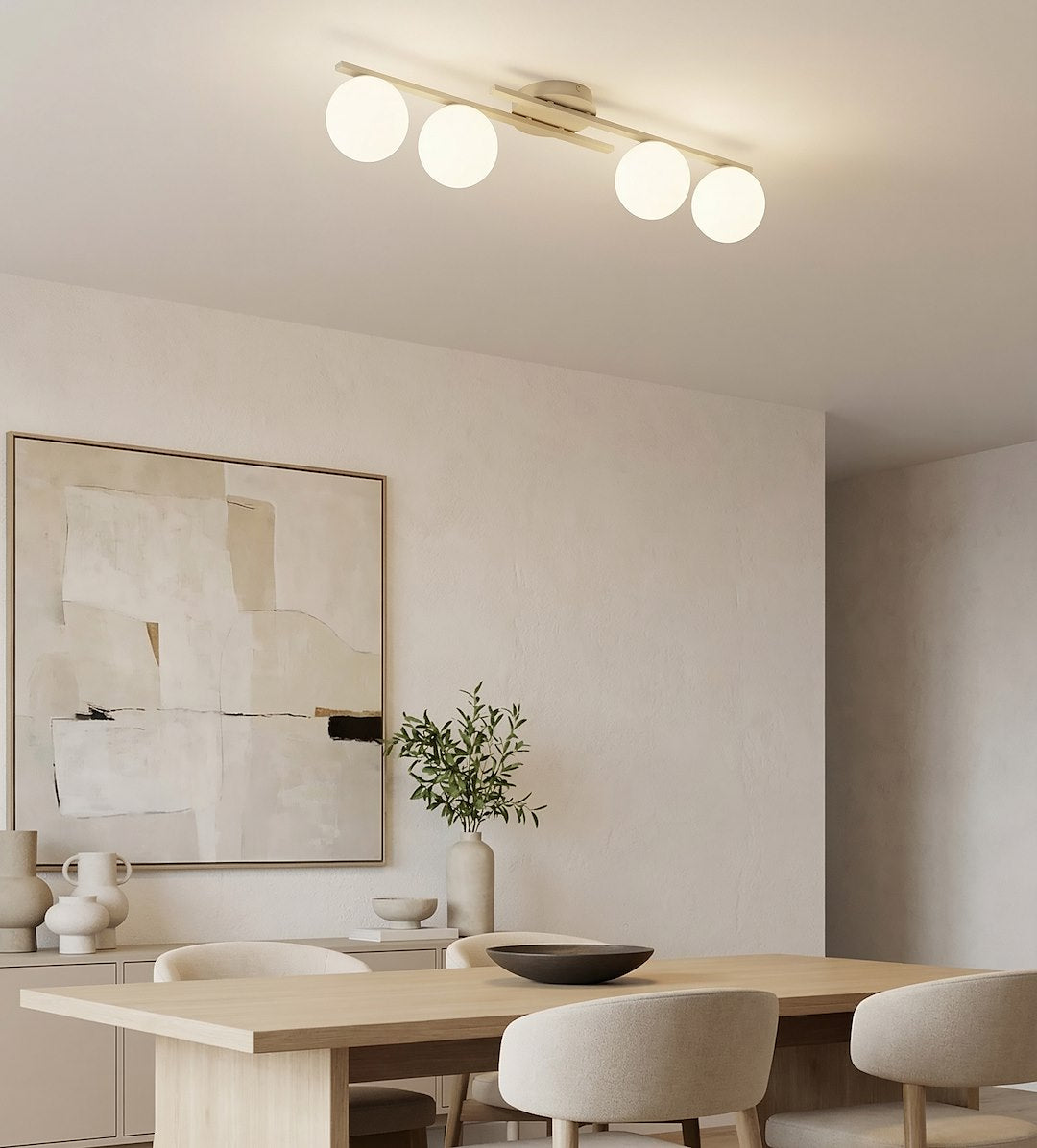 Plafonnier beige allumé au-dessus d'une table à manger dans une pièce claire