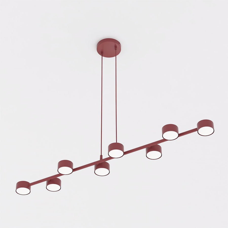 Vue de face sur fond blanc, suspension linéaire bordeaux avec huit diffuseurs cylindriques alignés.