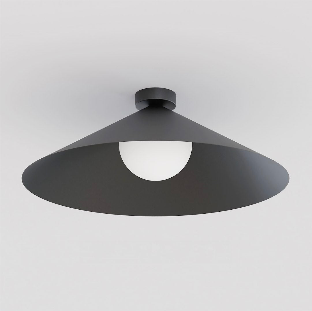 Vue de dessous montrant le diffuseur hémisphérique en verre blanc