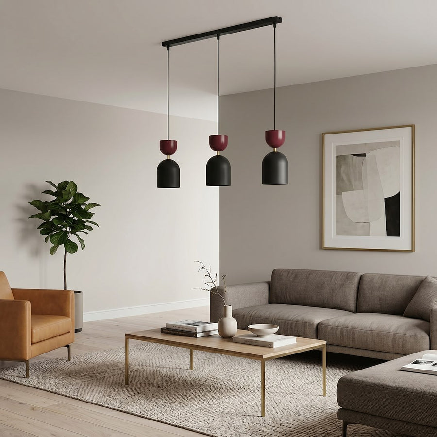 Suspension installée dans un salon beige avec canapé en tissu et plante verte