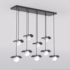 Suspension Flora 9 lumières noire, verre blanc