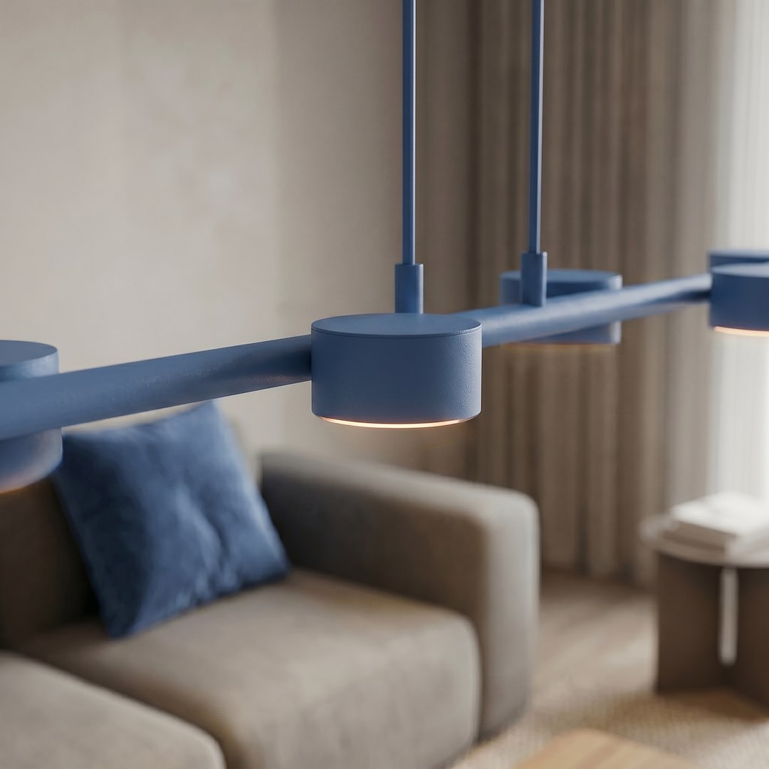 Détail rapproché d'une coupelle cylindrique bleue et de sa lumière chaude