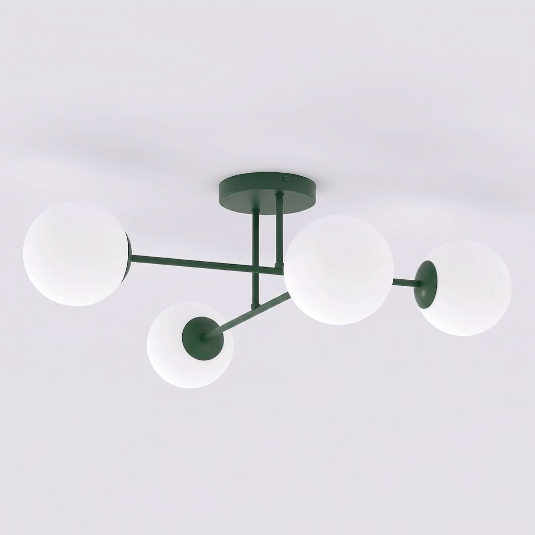 Produit isolé sur fond blanc, quatre globes opalines et structure vert mat