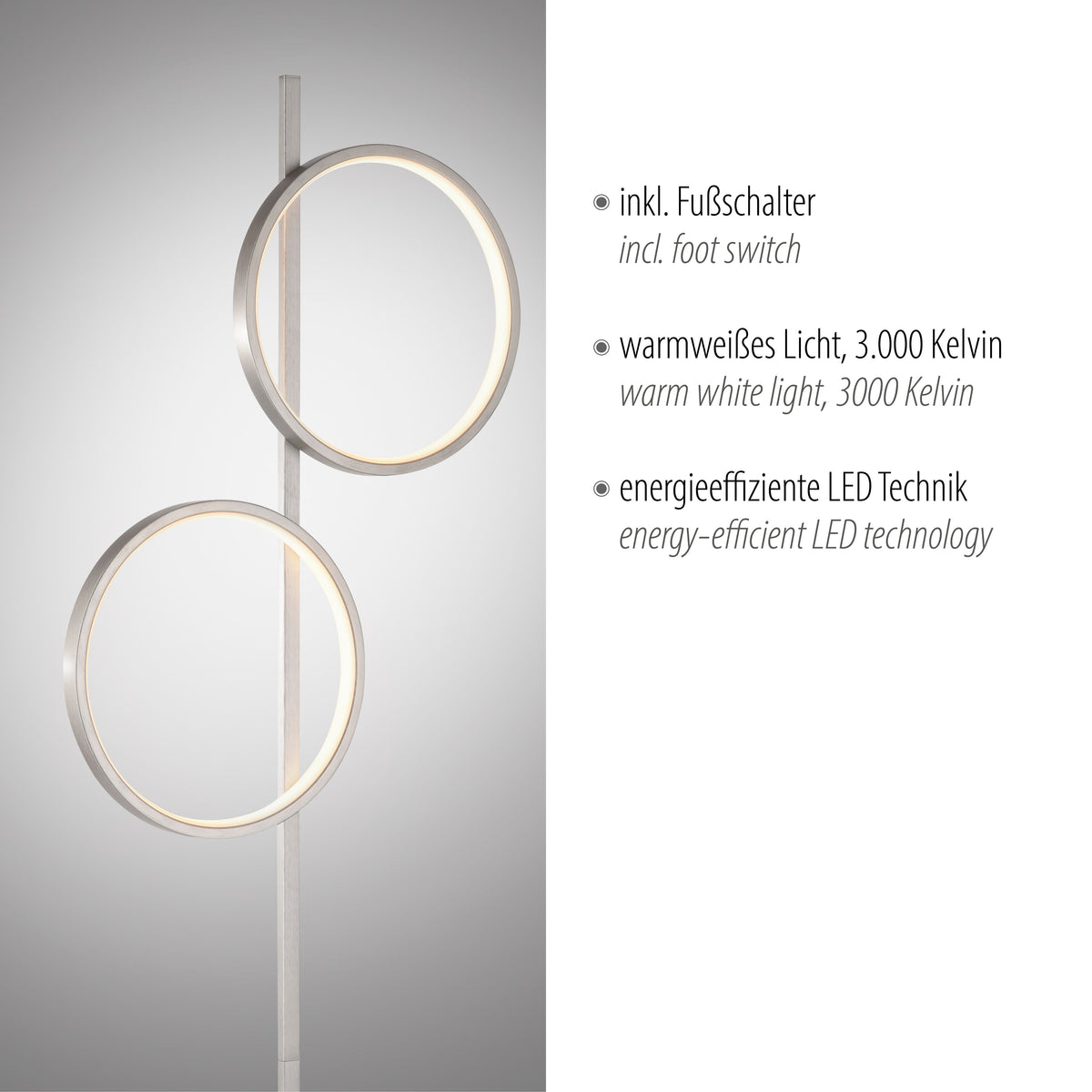 Détail du luminaire avec deux anneaux LED et texte sur interrupteur et lumière chaude.