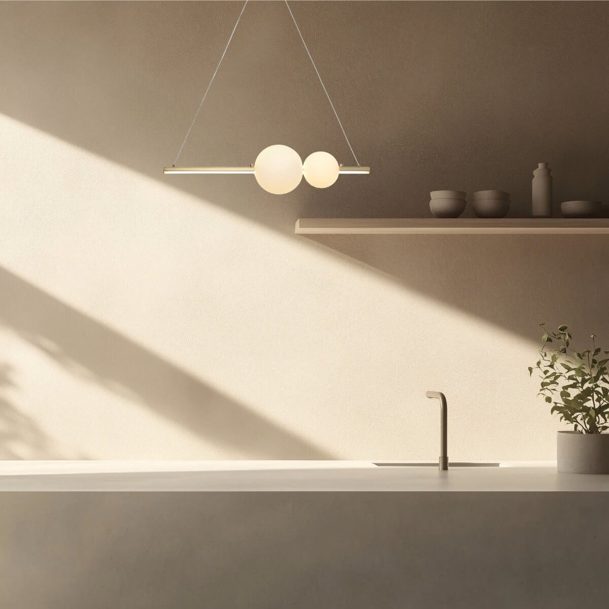 Photo d'ambiance cuisine avec suspension à deux globes et lumière chaude