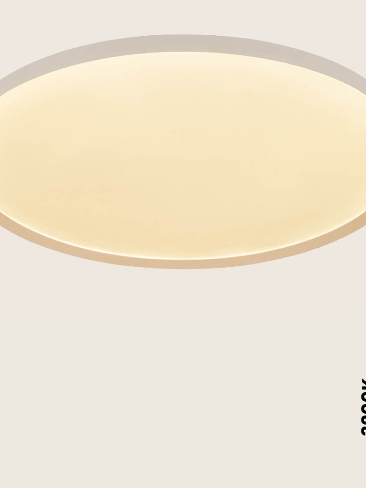 Luminaire éclairé à 3000K, teinte blanc chaud légèrement crème et uniforme