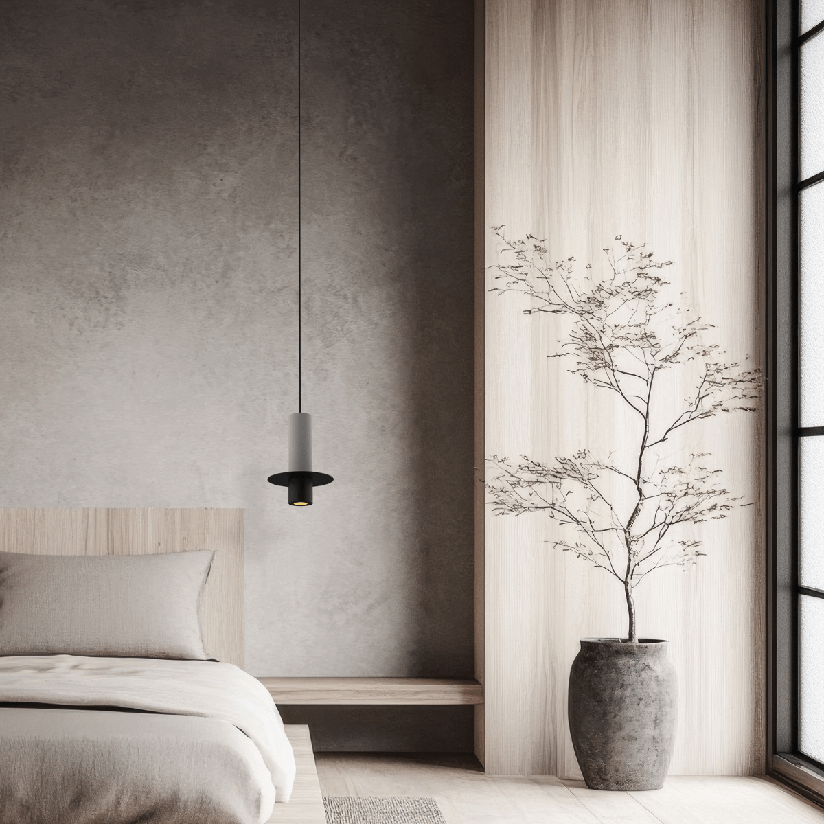 Vue rapprochée de la suspension éclairée dans une chambre minimaliste béton et bois