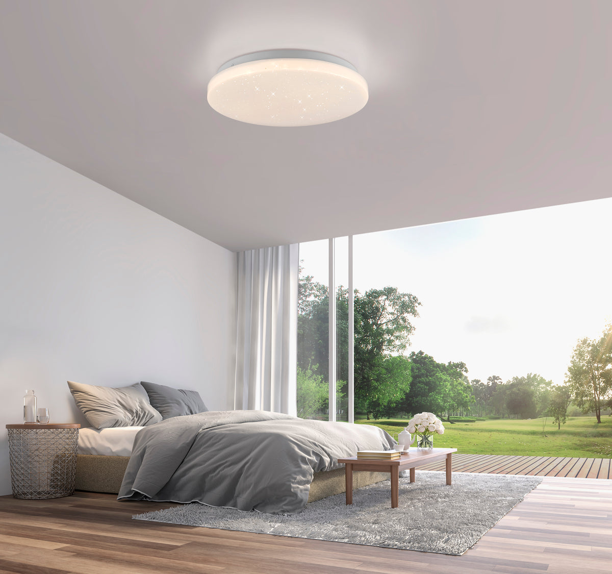 Mise en ambiance chambre moderne avec plafonnier allumé au-dessus du lit