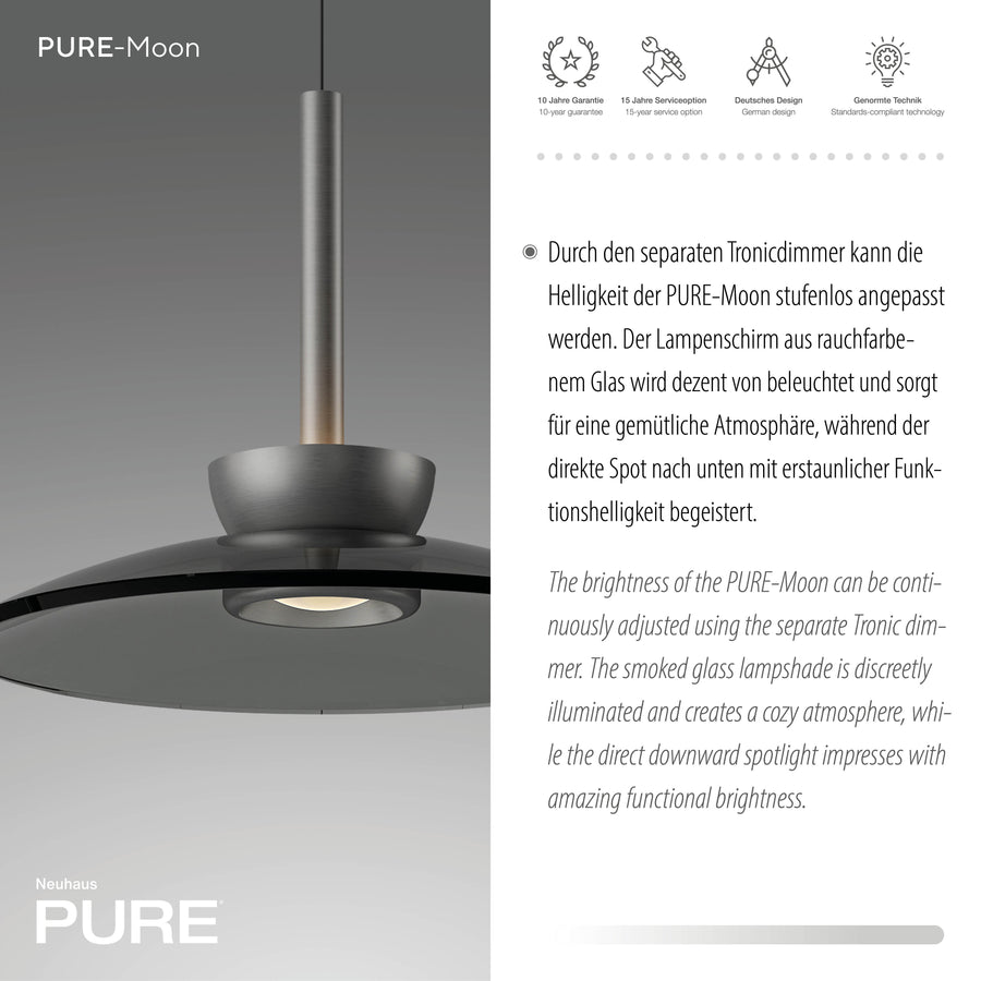 Gros plan sur l'abat-jour en verre fumé et le spot LED central