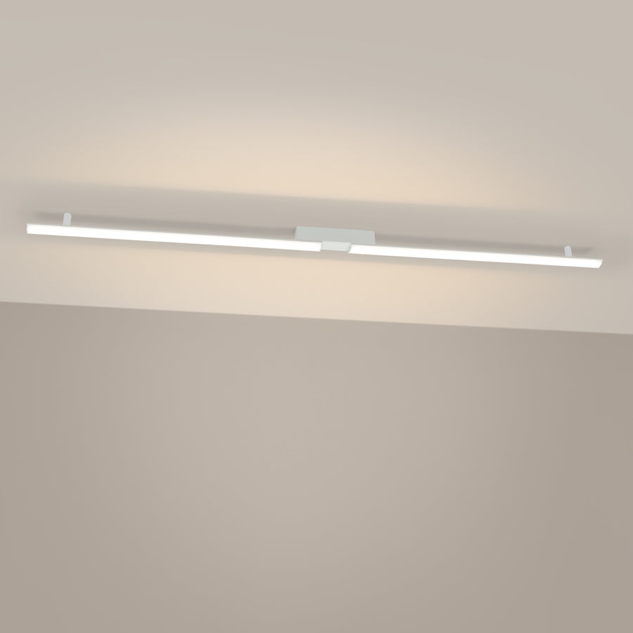 Luminaire allumé diffusant une lumière blanc chaud sur le plafond