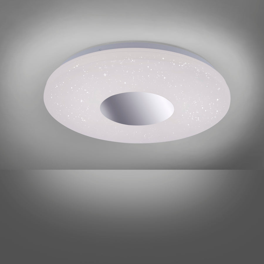 Gros plan du diffuseur étoilé illuminé et de son halo lumineux