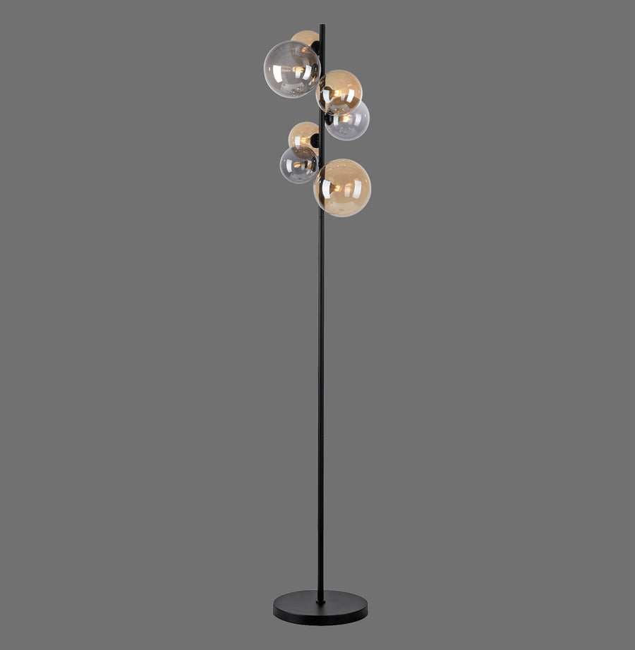 Lampadaire noir sur fond gris, montrant sept globes en verre fumé et ambré.