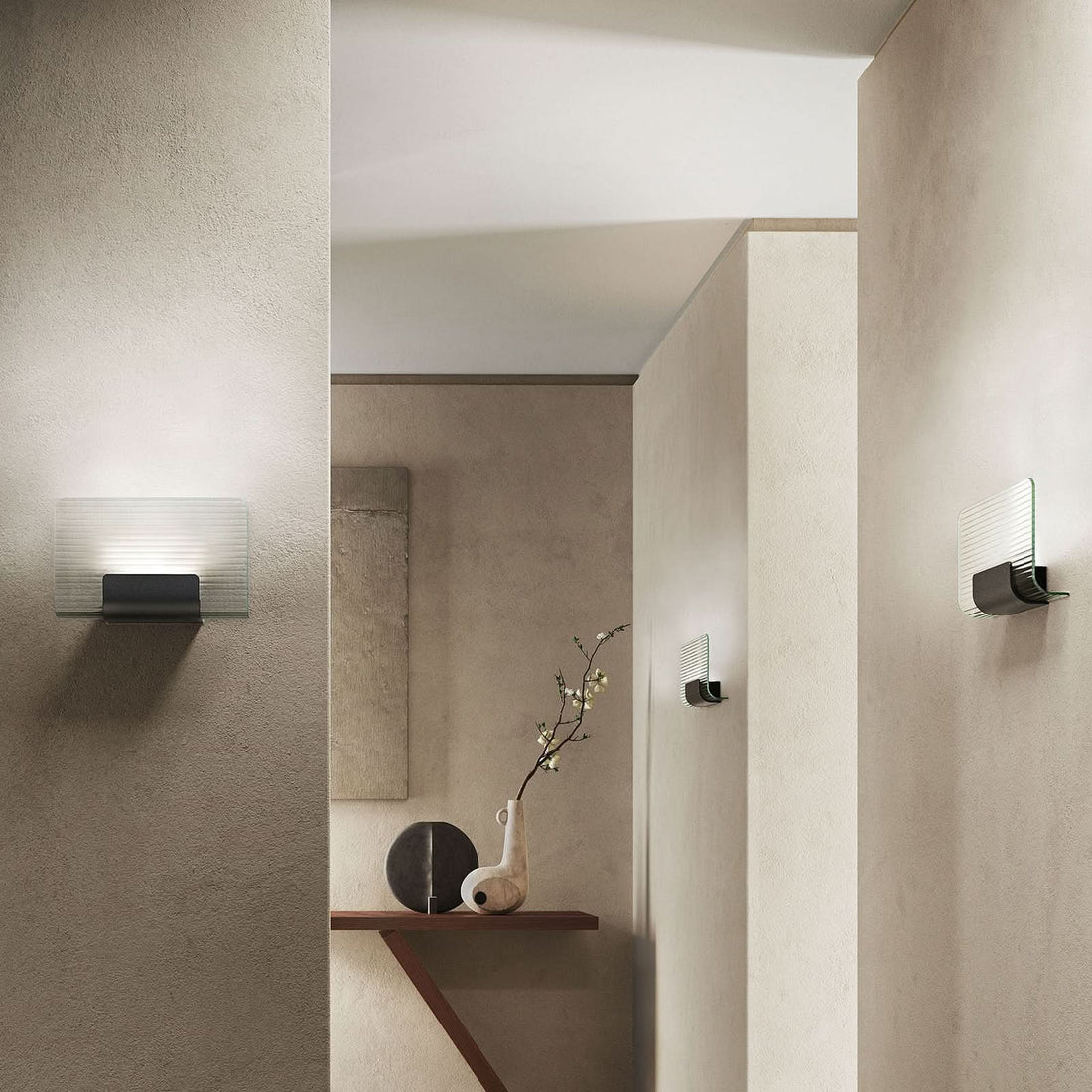 Applique murale LED Nami en verre, transparent et noir, hauteur 18 cm