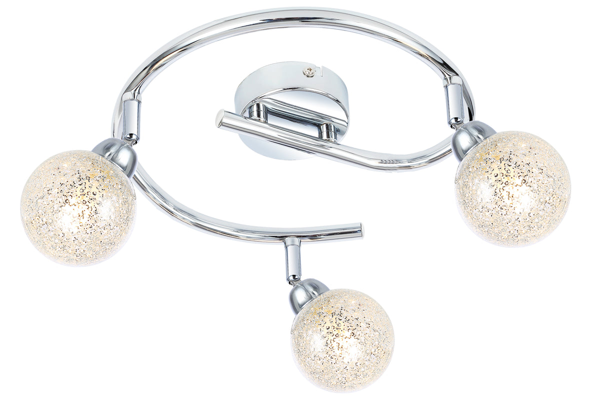 Vue de face du luminaire, anneau chromé et trois boules mouchetées allumées