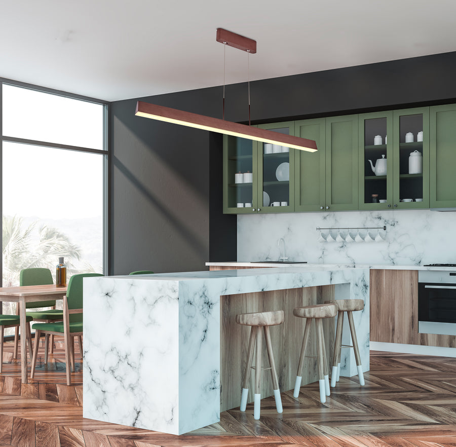Mise en ambiance cuisine contemporaine verte et marbre, suspension au-dessus de l'îlot central