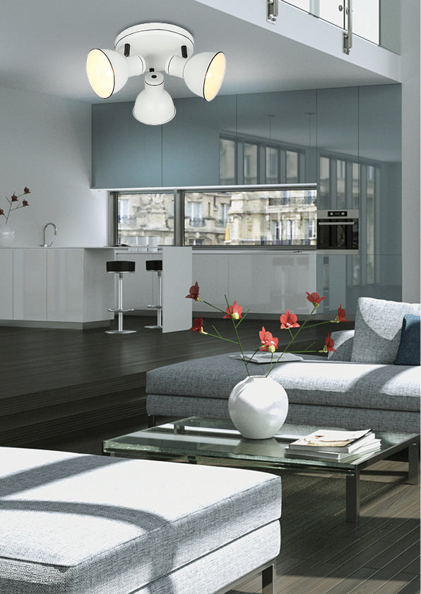 Mise en ambiance du plafonnier dans un séjour contemporain, au-dessus d'un canapé.