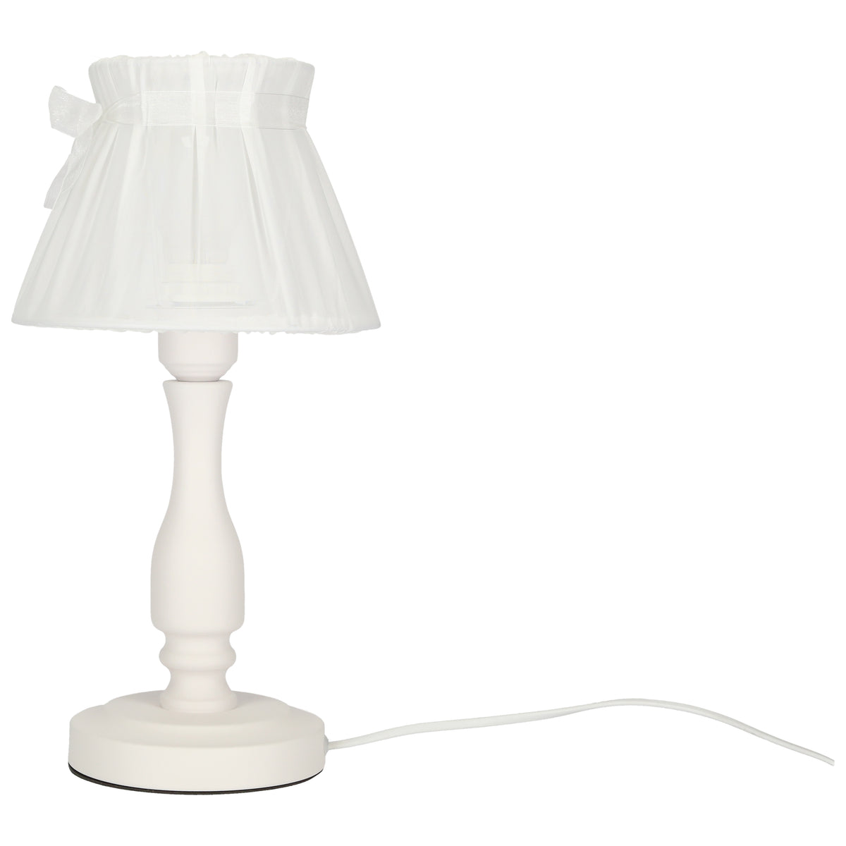 Lampe à poser blanche, vue de trois quarts, cordon d'alimentation blanc visible au sol.