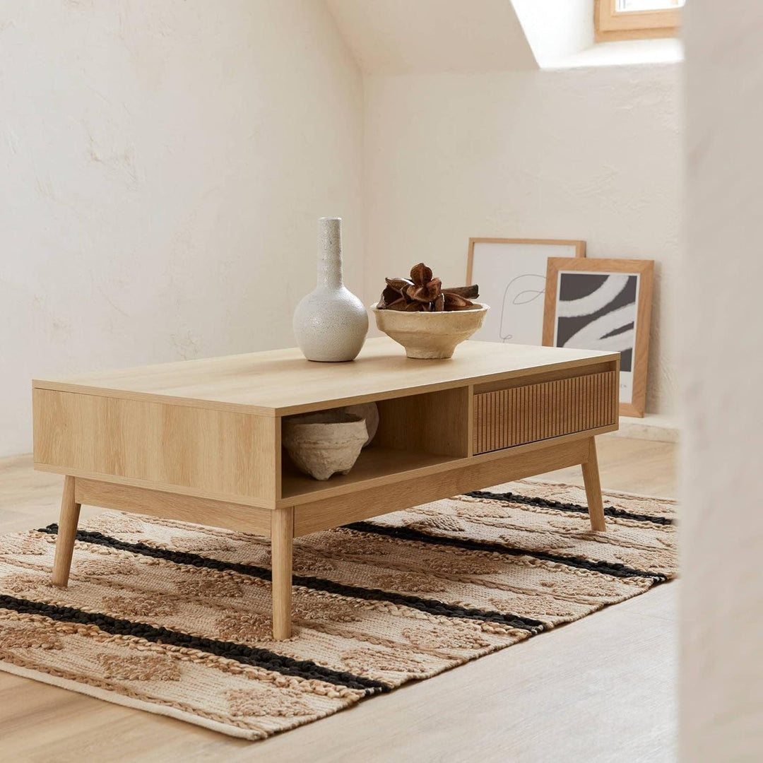 Alice'S Home - Table Basse Couleur Naturelle. Linear. Décor Bois Rainuré. Pieds Compas. 2 Niches. 1 Tiroir. L 110 X L 59 X H 39Cm | Designix - Amazon    - https://designix.fr/