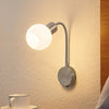 Applique murale Lioma en verre, nickel satiné, hauteur 28 cm
