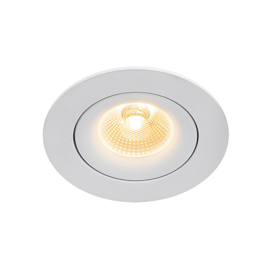 Spot blanc vu de face en plongée, source LED allumée et diffuseur strié