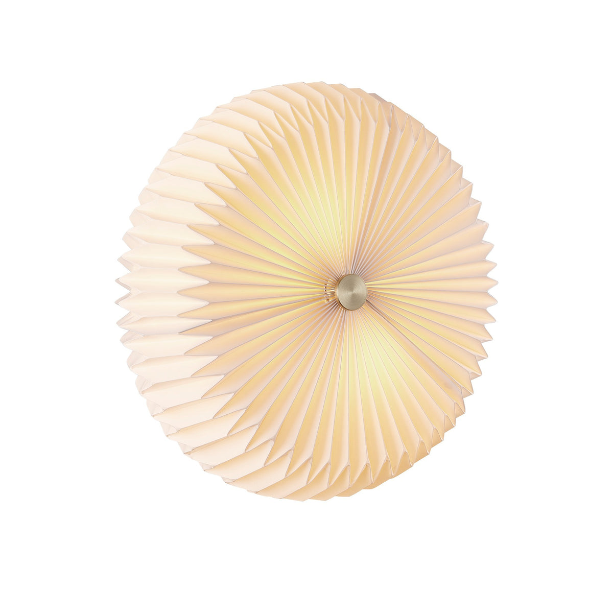 Vue plongeante éclairée révélant la lumière chaude filtrée par le papier plissé.