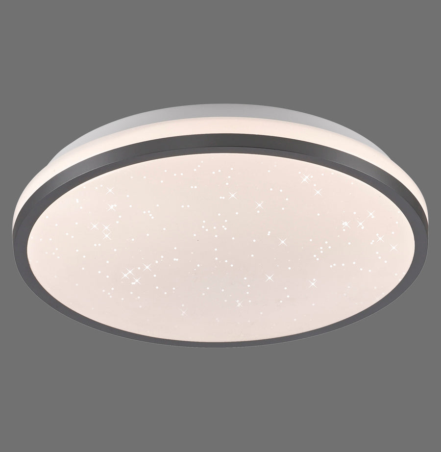 Plafonnier rond noir et blanc de face, sur fond gris uni