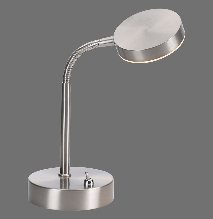 Vue de face de la lampe à poser argentée sur fond gris neutre