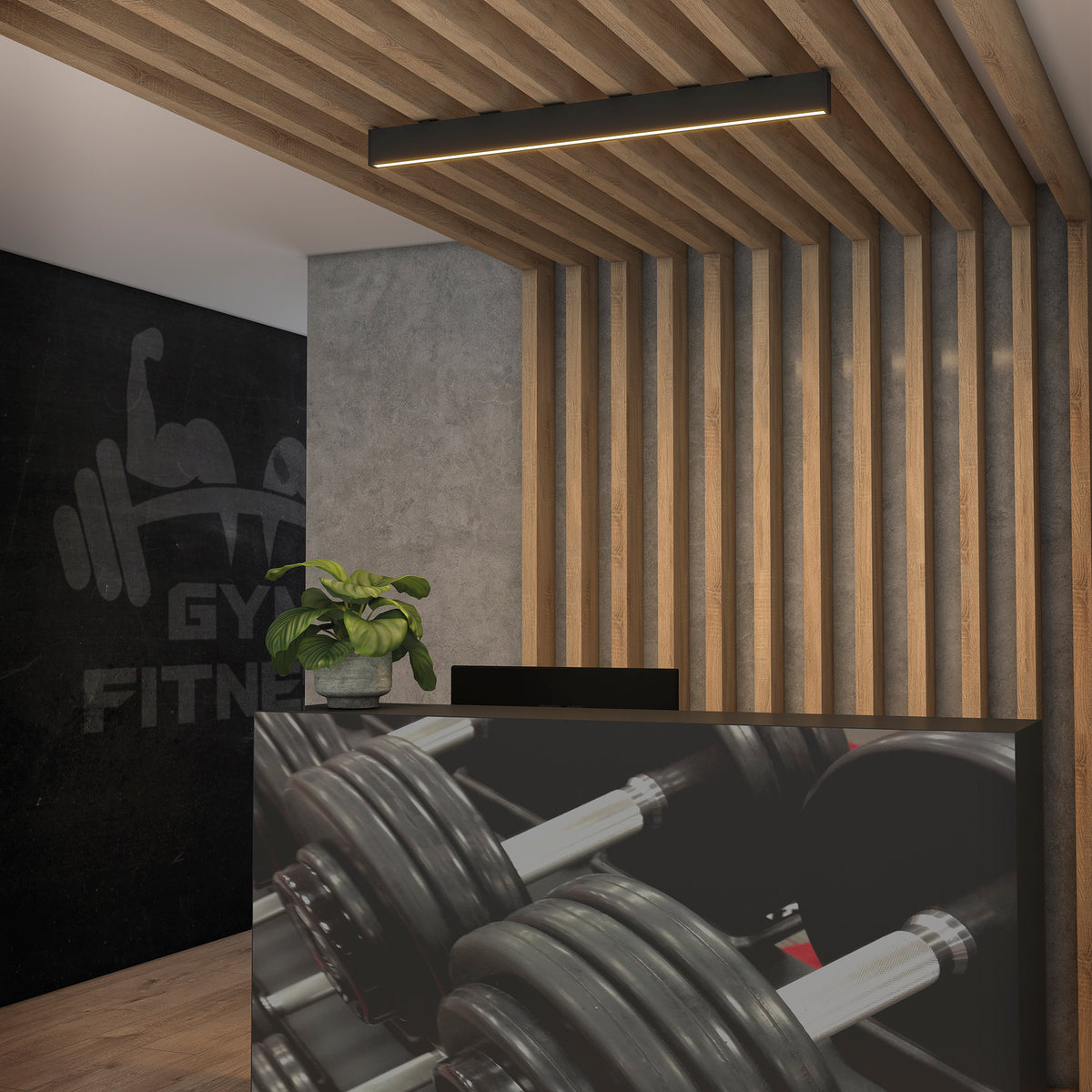 Plafonnier noir installé sur un plafond à lattes bois dans une salle de sport.