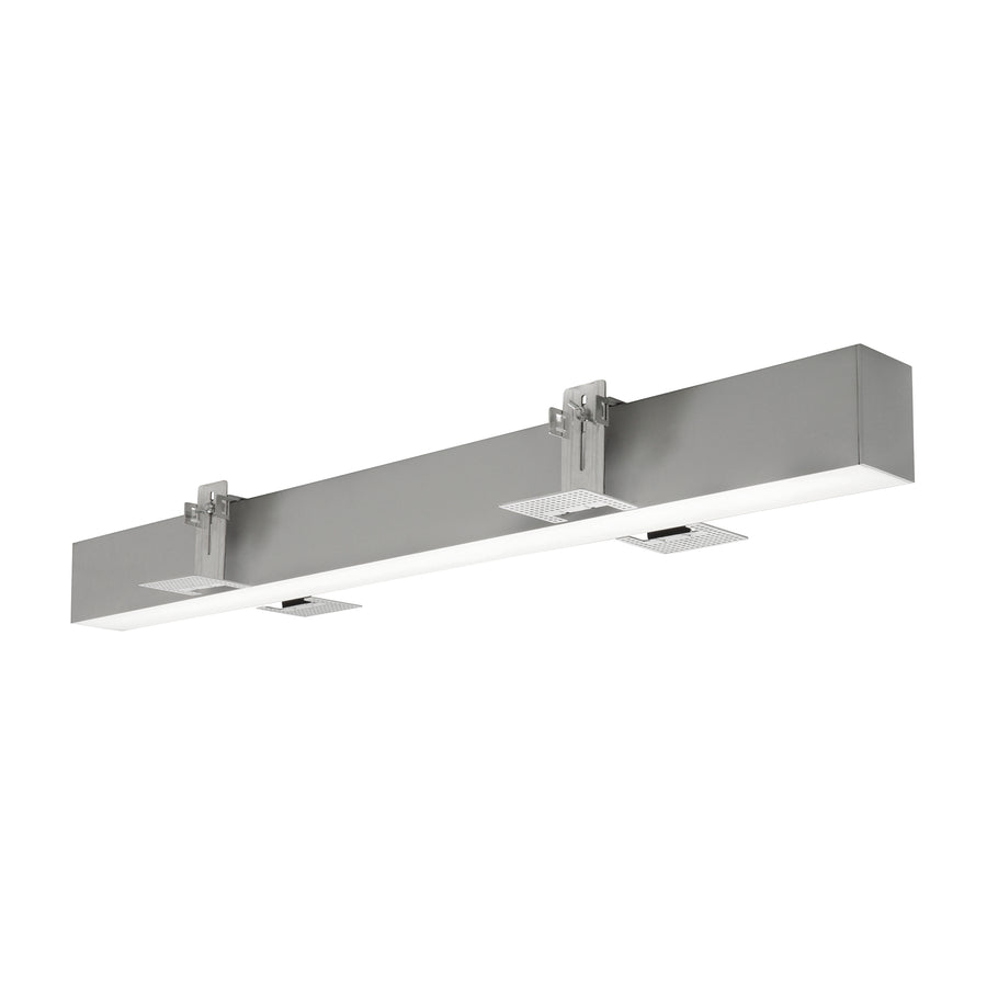 Version grise du luminaire linéaire, supports métalliques et long diffuseur lumineux apparent.