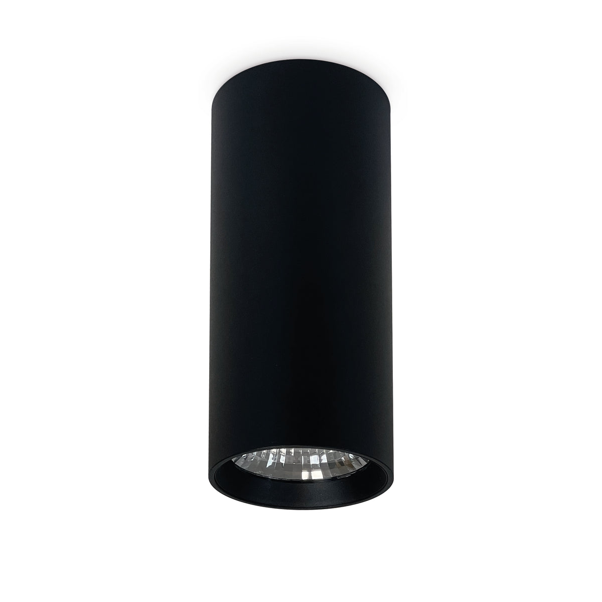 Spot cylindrique noir en saillie, collerette assortie et optique LED apparente.
