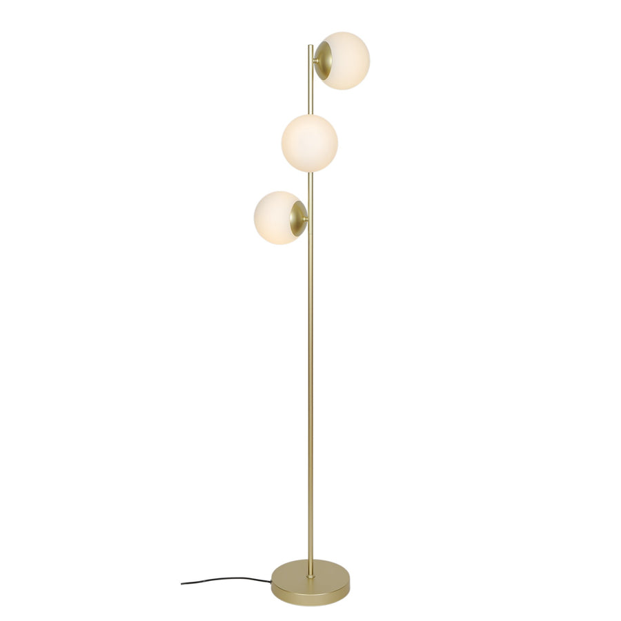 Lampadaire à trois globes opalins allumés, pied doré fin, vue de face