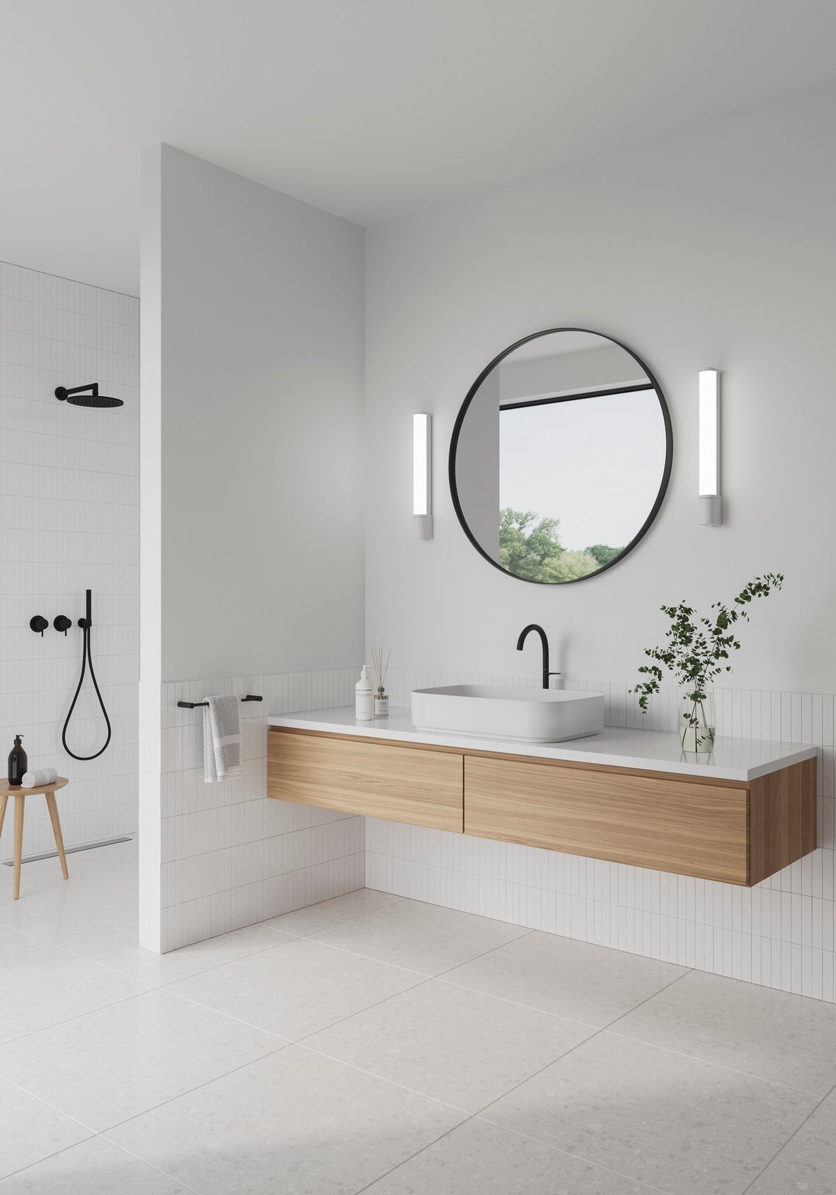 Mise en ambiance dans une salle de bain, appliques de part et d'autre du miroir