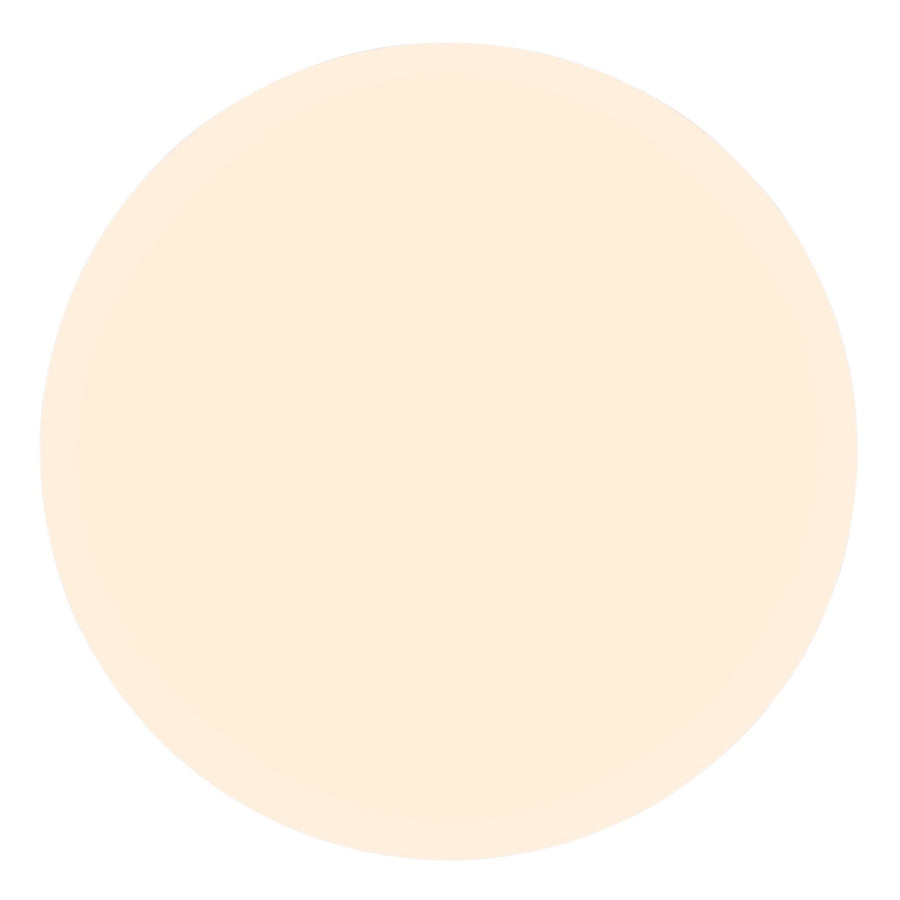 Vue de face montrant le diffuseur circulaire blanc chaud du plafonnier.