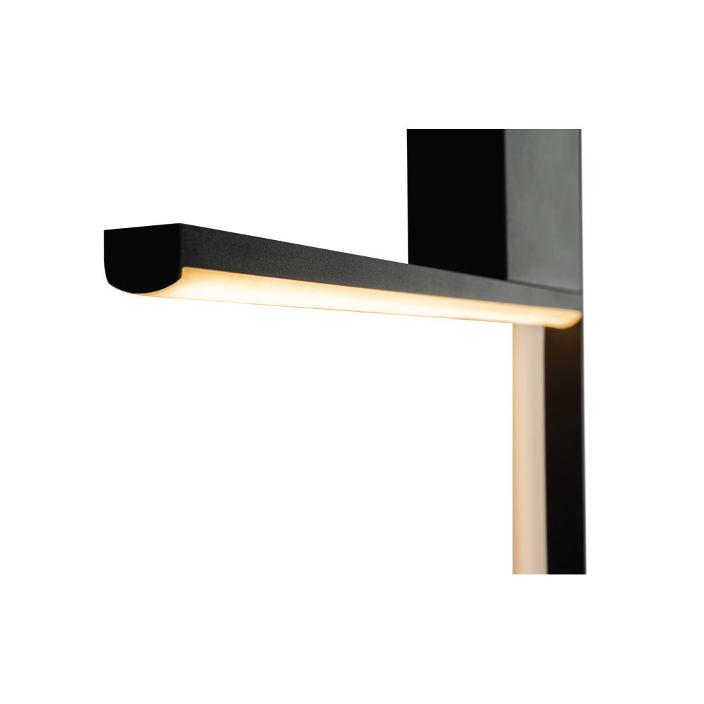 Détail du bandeau LED allumé sous le bras, lumière chaude et diffuse